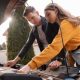 couple with a car that won't start after an accident